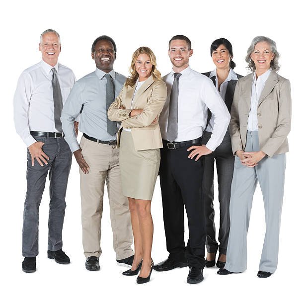 istock Happy diverse team in business attire standing confidently; studio shot 180700245