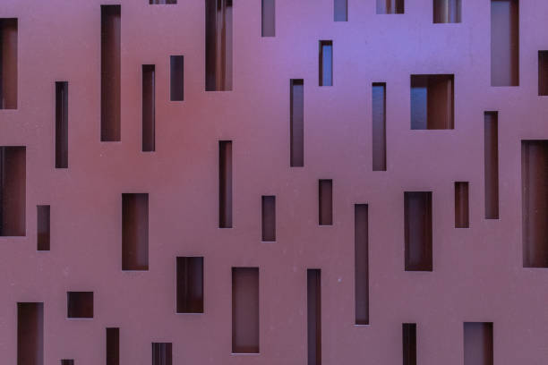 istock Brown metal background texture with geometric openings 1807008175