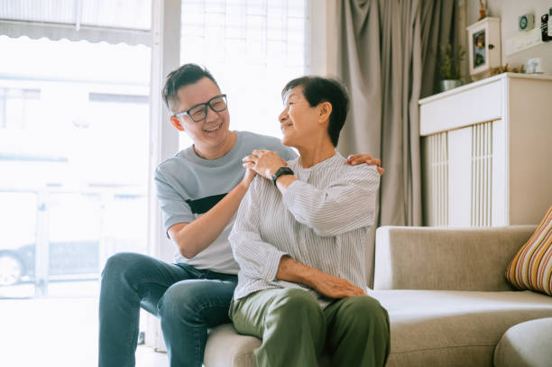 istock Asian man massage his mother at home. 1807015940