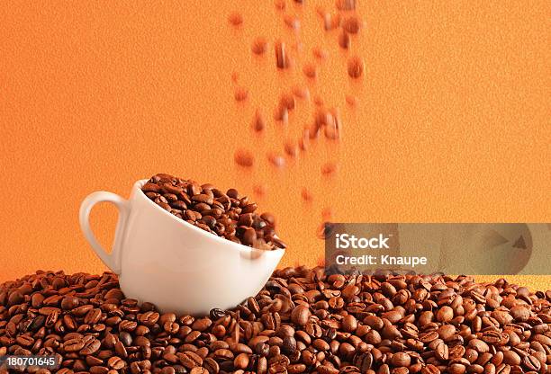 Coffee Beans Falling Into White Cup Stock Photo - Download Image Now - Blurred Motion, Coffee - Drink, Coffee Crop