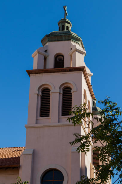 istock Low angle view of historic church bell tower in Spanish Architecture 1807019109
