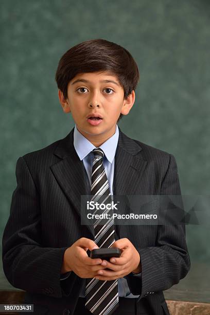 Foto de Retrato De 12 Anos De Idade Menino Em Traje De Negócios e mais fotos de stock de 10-11 Anos
