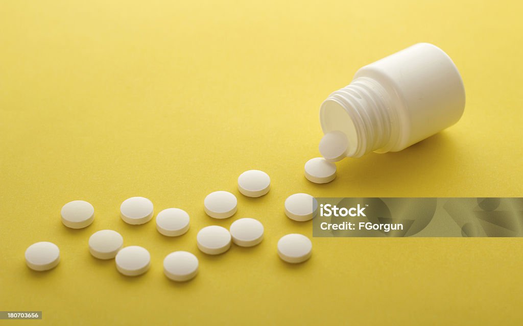 Spilled Pills from Prescription Bottle Bottle Stock Photo