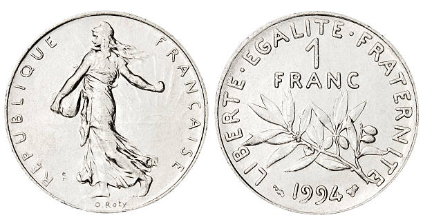 French Franc on white background French Franc coin. Isolated on white with clipping path. french currency photos stock pictures, royalty-free photos & images