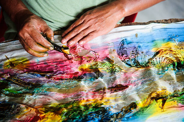 Batik Making with wax Batik Making with wax balinese culture stock pictures, royalty-free photos & images