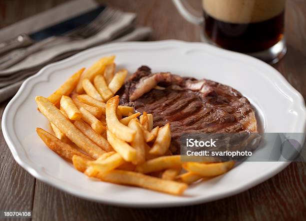 Beef Steak With French Fries Stock Photo - Download Image Now - American Culture, Barbecue - Meal, Barbecue Grill