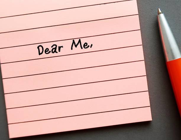 istock Note with handwritten text DEAR ME, concept of self compassion by writing compassionate note to self, beat negative inner voice 1807046753