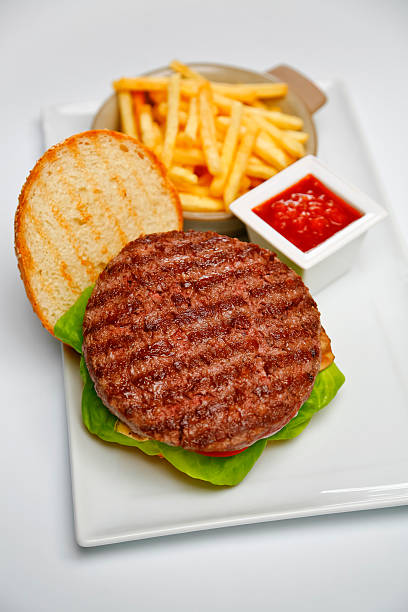 istock open burger and french fries 180704894