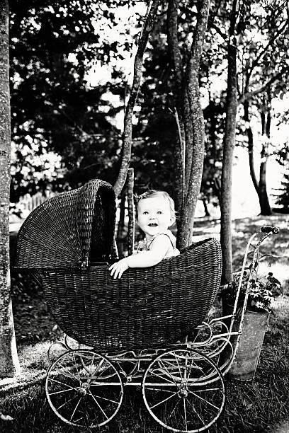 istock Baby in Antique Pram 180704998