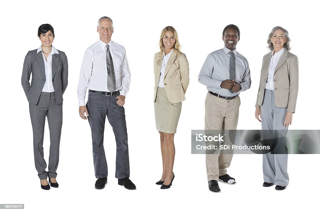 Zróżnicowana grupa profesjonalnych ludzi biznesu w linii; Ujęcie studyjne - Zbiór zdjęć royalty-free (Białe tło)