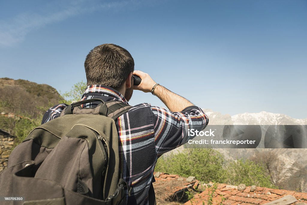 looking forward with the binocular  Searching Stock Photo