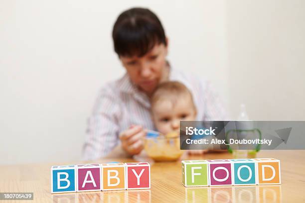 Foto de Menino Comida Para Bebês Conceito Geral e mais fotos de stock de 6-11 meses - 6-11 meses, Adulto, Alimentar