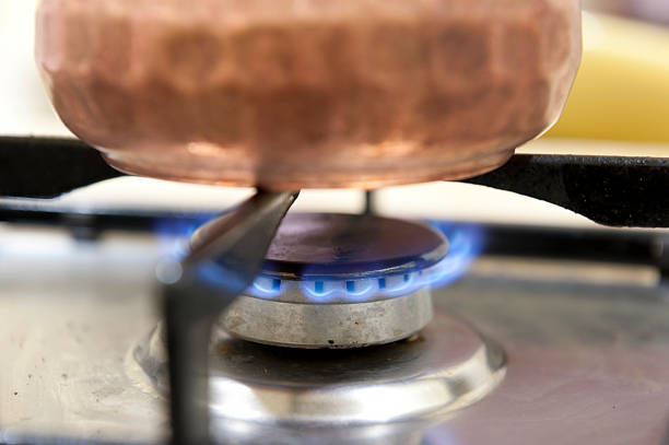 istock Turkish Coffee Pot (Cezve) being cooking on gas stove 180705466