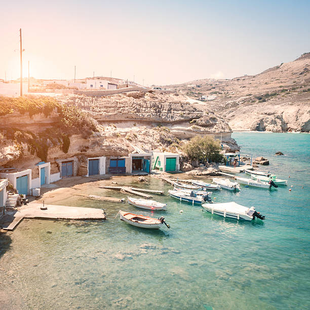 The amazing small port of Mandrakia, Milos Island, Cyclades, Greece. Mandrakia is a little port with the typical syrmata, where boats can be stored during the winter season.