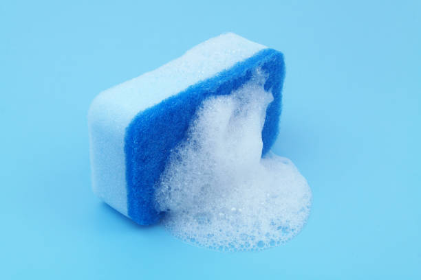 istock Blue sponge with foam on blue background. 1807057802