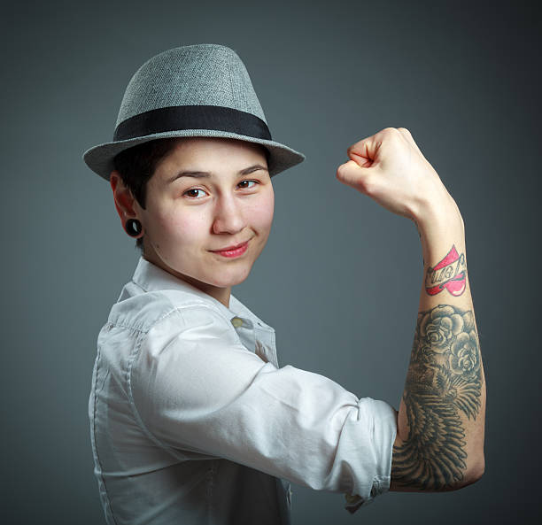 istock girl in white shirt isolated on a grey background 180706052