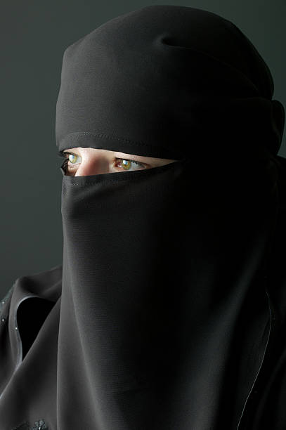istock Woman dressed in traditional muslim clothes 180706241