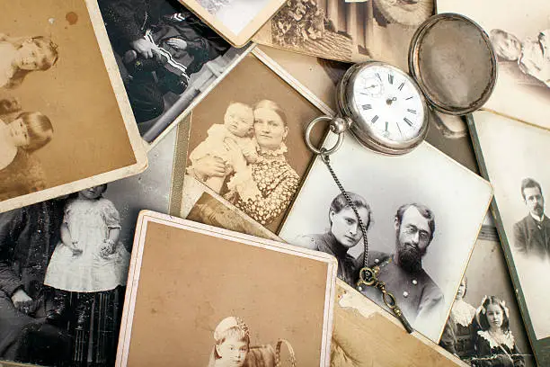 Pocket watch on old photographs.