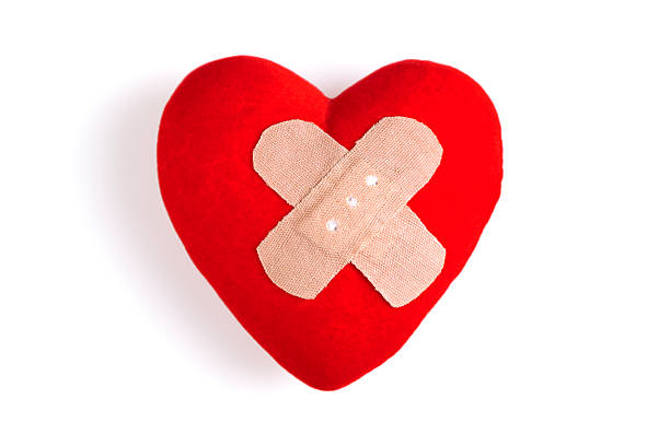 istock Heart with Adhesive Bandage 180707068