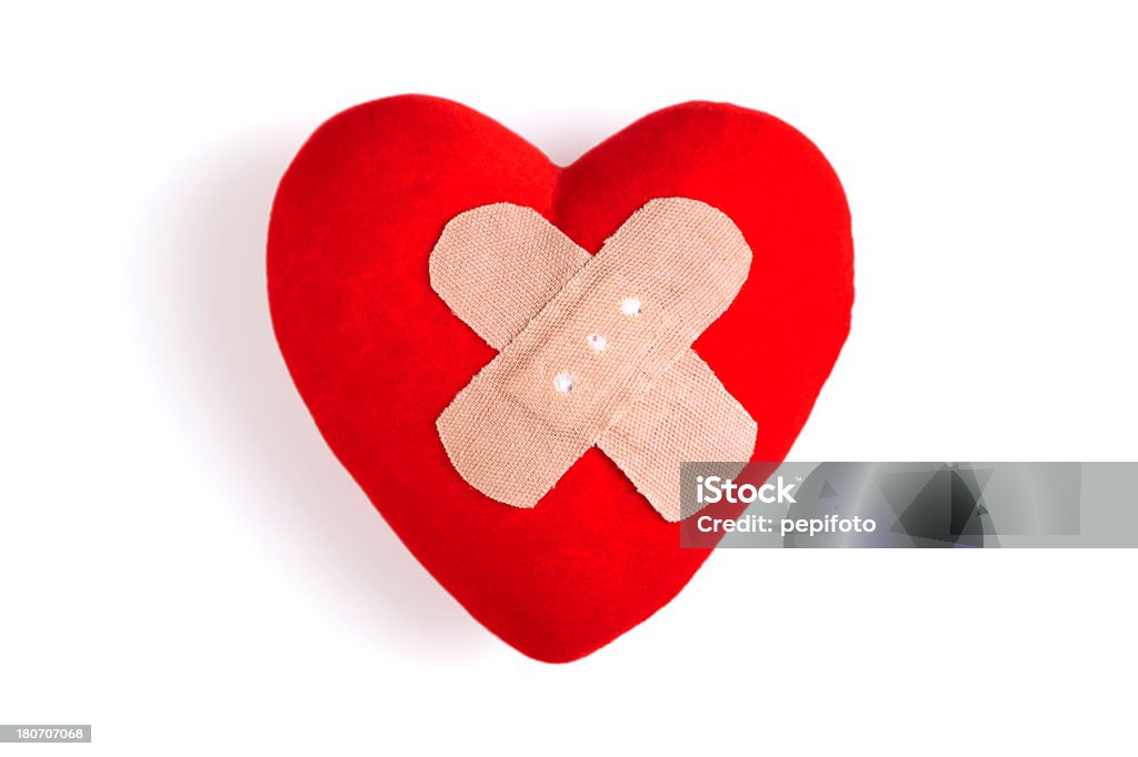 Heart with Adhesive Bandage Heart with Adhesive Bandage isolated on white Adhesive Bandage Stock Photo