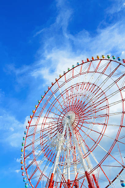 istock Ferris wheel with blue sky 180707279
