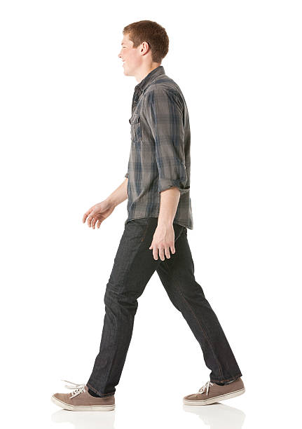 istock Profile of a young man walking 180707366