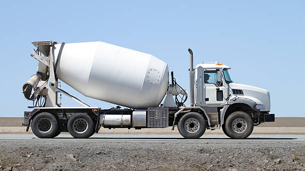 Construction Industry, Cement Truck Delivering A Load Of Concrete stock photo