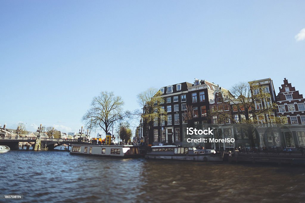 Amsterdam, Amstel River Canal in Amsterdam by day. Amstel River Stock Photo