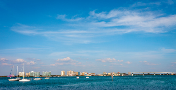 Skyline of Sarasota Florida. Sailboats and bay in foreground.