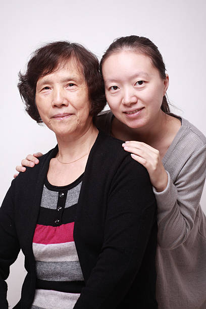Happy Chinese mother and daughter