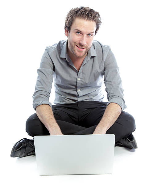 istock Attractive man wearing a grey shirt isolated on white background 180708588