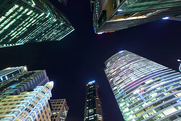 istock Singapore business building at night 180709050