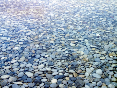 Pebble stones in water