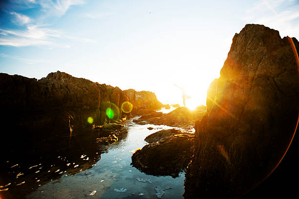 istock Female meditating on the rocks 180709880
