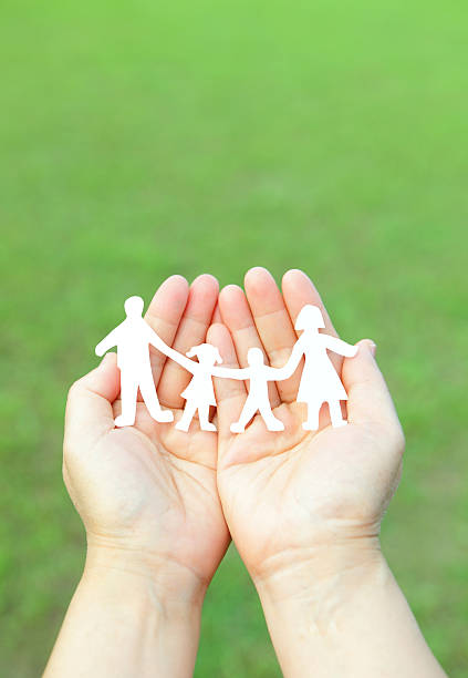 istock Paper family in hands 180709947