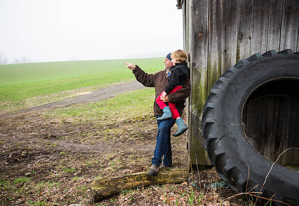 istock Father and son on the farm 180710560