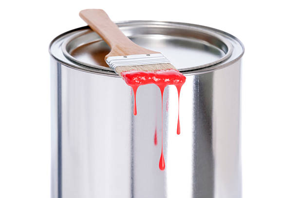 istock Red dripping paint brush on a tin of paint 180710786