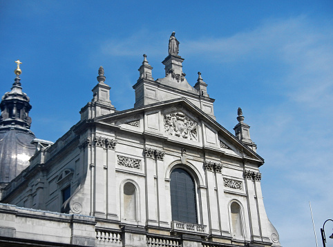 Pantheon : zinc dome and columns like a Greek temple. Sunny day and blue sky in background. It's a secular mausoleum containing the remains of distinguished French citizens.Located in the 5th arrondissement of Paris on the Mountain Saint Genevieve