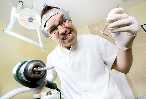 crazy dentist stock photo
