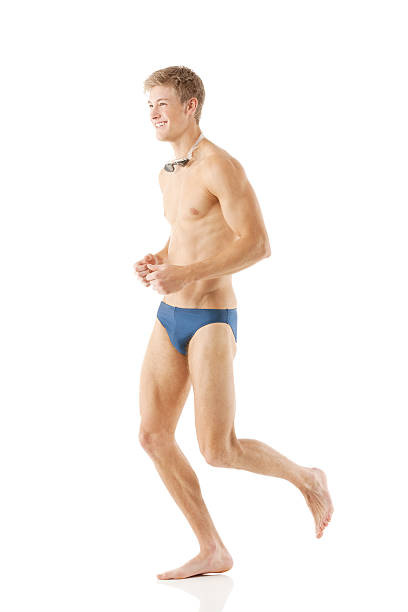 мужской скорости бега - swimming trunks men muscular build athlete стоковые фото и изображения