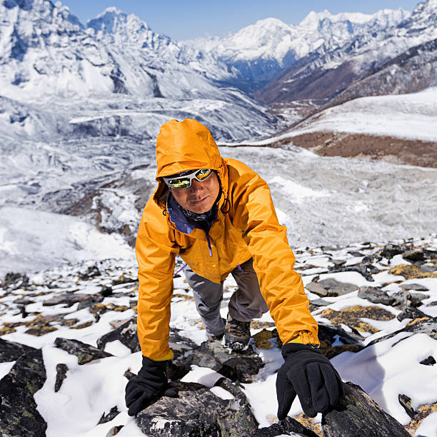 istock Nepali sherpa climbing in Himalayas 180711502