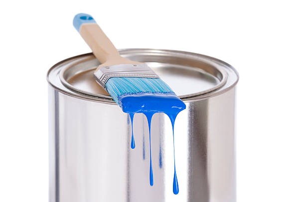 istock Blue dripping Paint Brush on a tin of paint 180711549