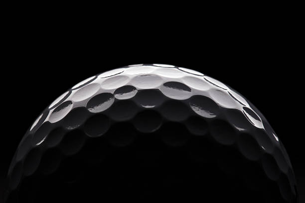 Golf Ball on Dark Background stock photo