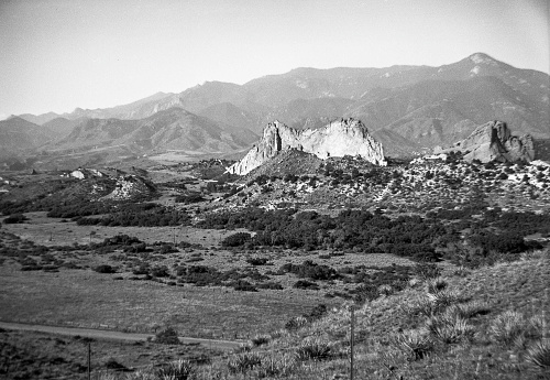 Gray Rock (Cathedral Rock) in Garden of the Gods with Cameron Cone in the background from near present day visitors center. Taken on September 8, 1946.