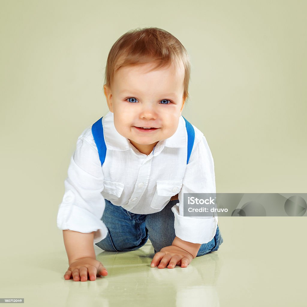 Poco niño atractivo Sonriendo - Foto de stock de Bebé libre de derechos