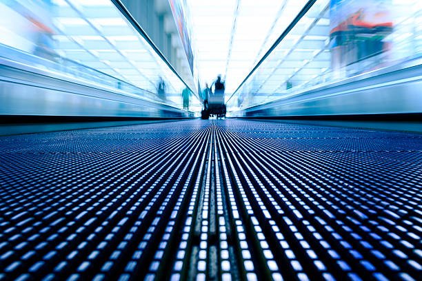 istock Blurred Motion of Businessman Walking in walkway 180712151