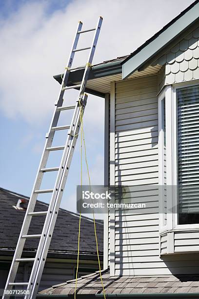 House Stock Photo - Download Image Now - Roof Gutter, Cleaning, Ladder