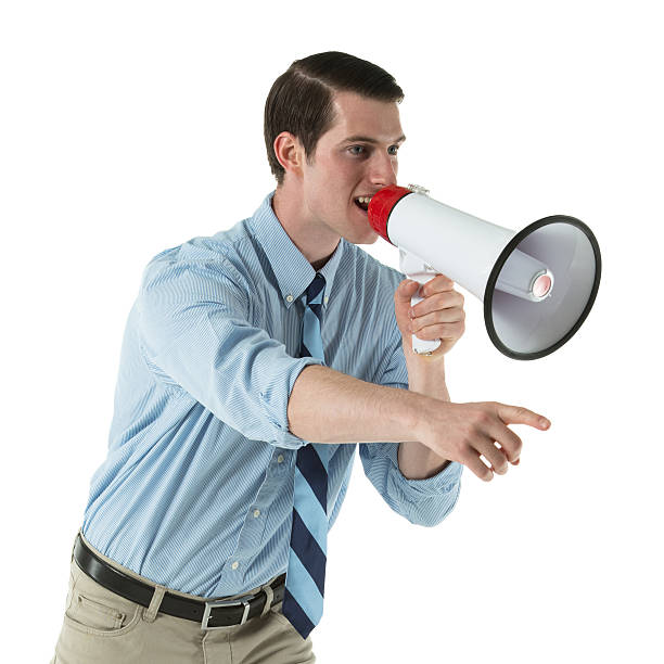 istock Businessman shouting into a bullhorn and pointing 180712884