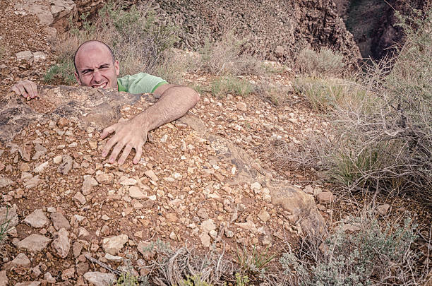 istock Man climbing the rock on grand canyon 180713185