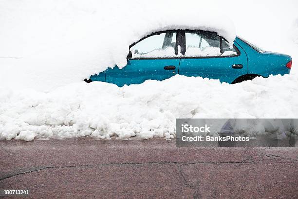 Snow Covered Car Parked On Plowed Street Stock Photo - Download Image Now - Blizzard, Blue, Car